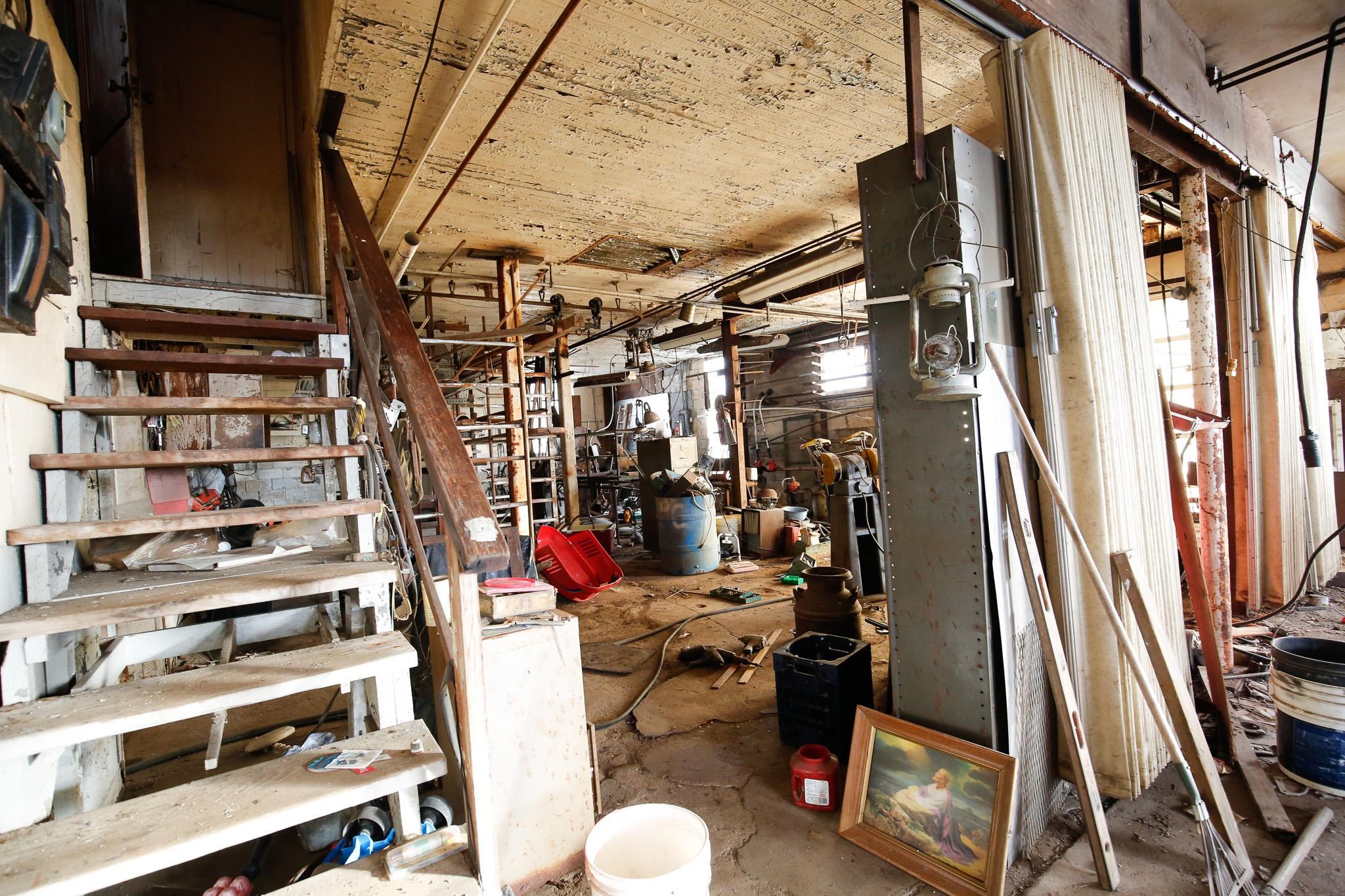 7916 West Pines Road Polo, IL 61064 - Photo 13 of 42 a view of walk in closet with clothes and shoes