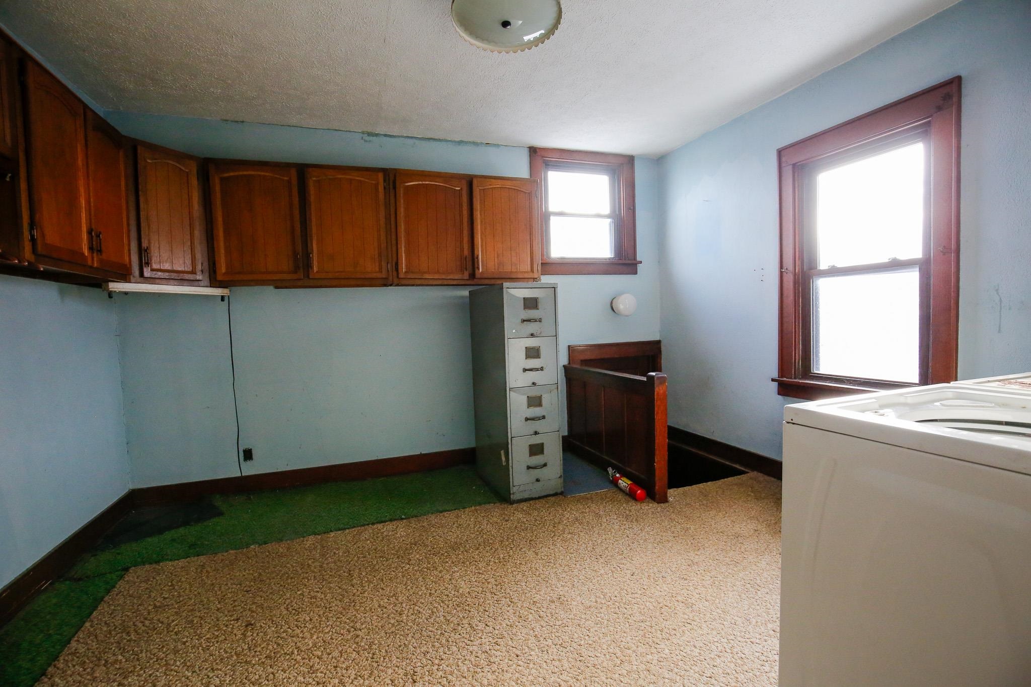 7916 West Pines Road Polo, IL 61064 - Photo 14 of 42 a view of room with workspace and windows