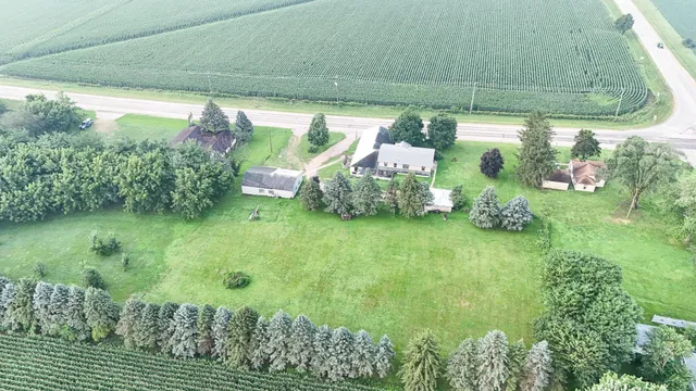 a backyard of a house with lots of green space