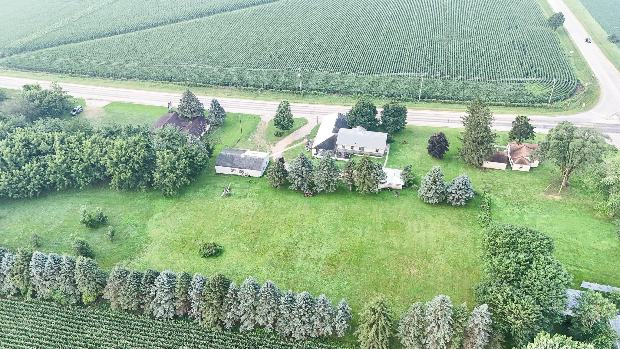 7916 West Pines Road Polo, IL 61064 - Photo 7 of 42 a backyard of a house with lots of green space