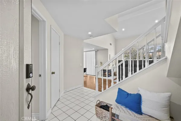 a view of entryway with wooden floor