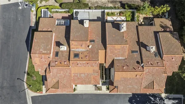 aerial view of residential houses with outdoor space