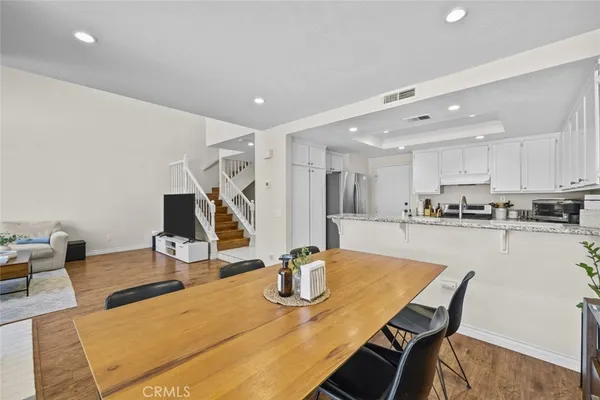 a view of a dining room with furniture