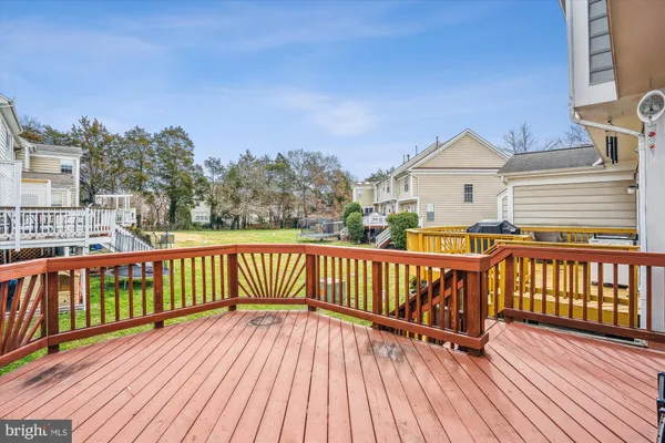 a view of a wooden roof deck