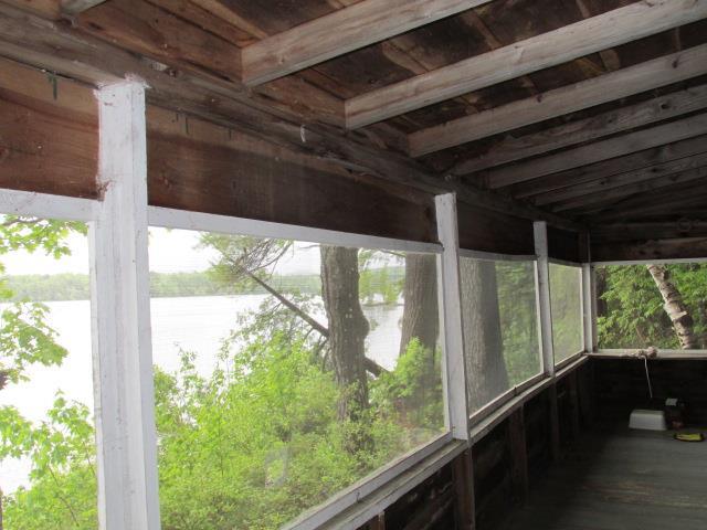 104 Pine Beach Road Belgrade, ME 04917 - Photo 16 of 21 screened in front porch