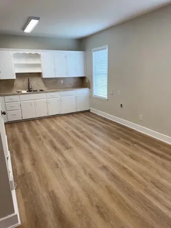 a view of a kitchen with a sink