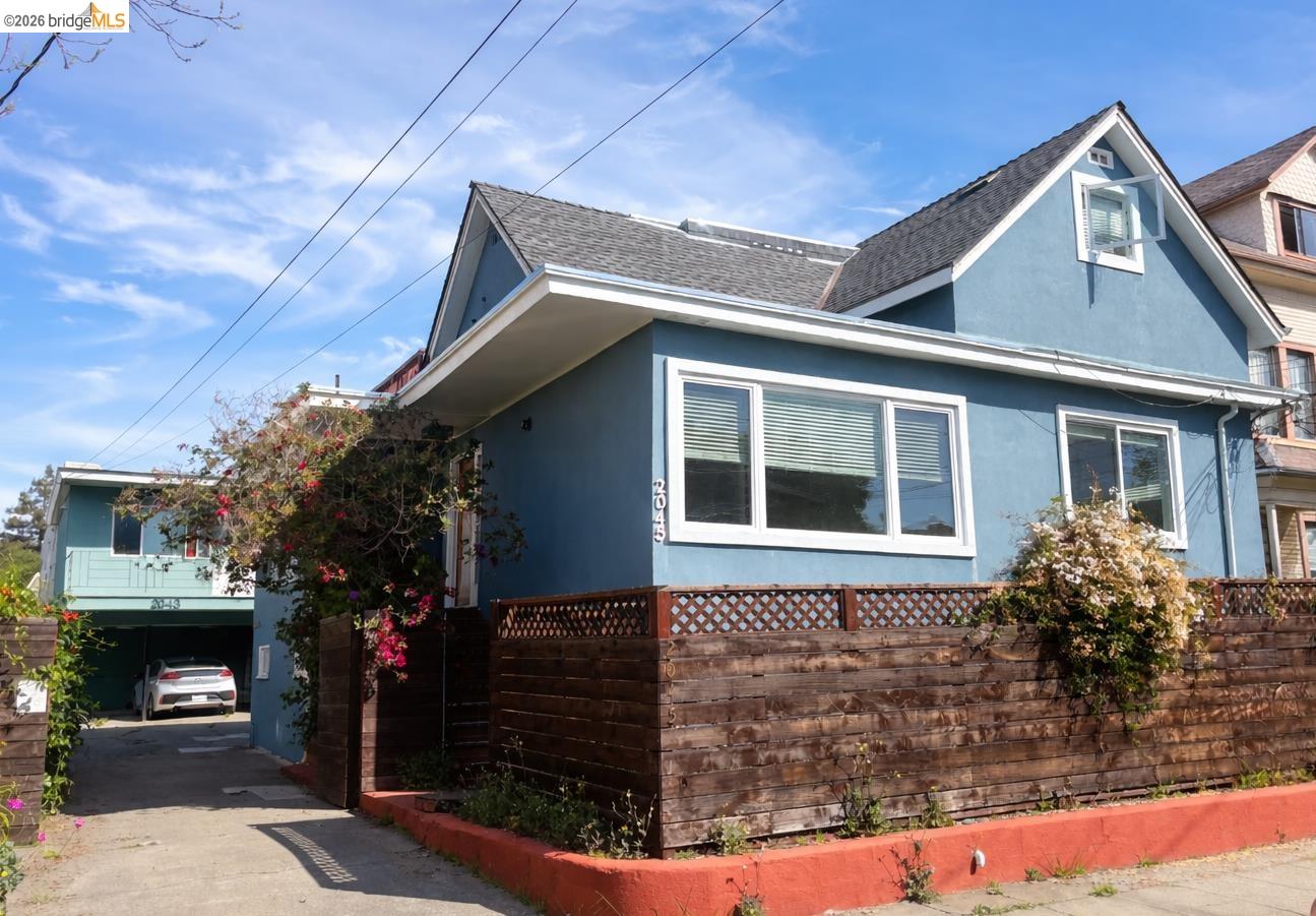 2045 Emerson Street Berkeley, CA 94703 - Photo 2 of 19 a front view of a house with garden