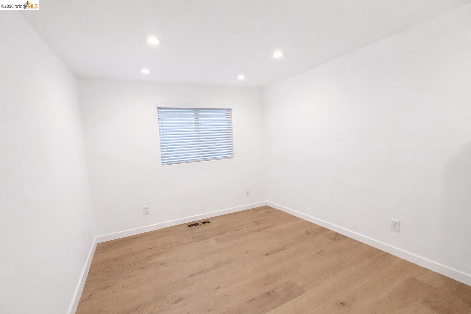 2045 Emerson Street Berkeley, CA 94703 - Photo 10 of 19 an empty room with a workbench