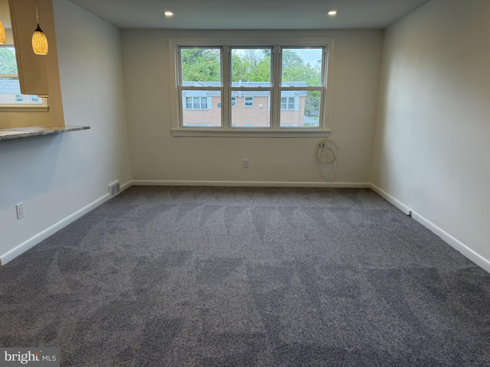 22 Windsor Road, Unit 2 Glenside, PA 19038 - Photo 7 of 29 Bright and airy living space awaits.