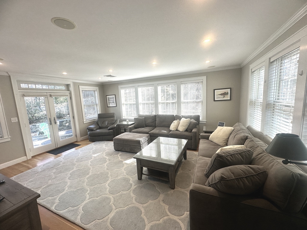 164 Florence Road Waltham, MA 02453 - Photo 18 of 19 a living room with furniture and a large window