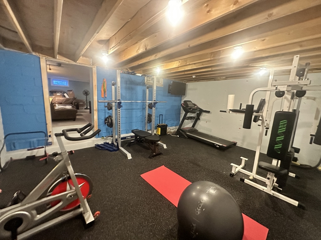 164 Florence Road Waltham, MA 02453 - Photo 6 of 19 a room with gym equipment