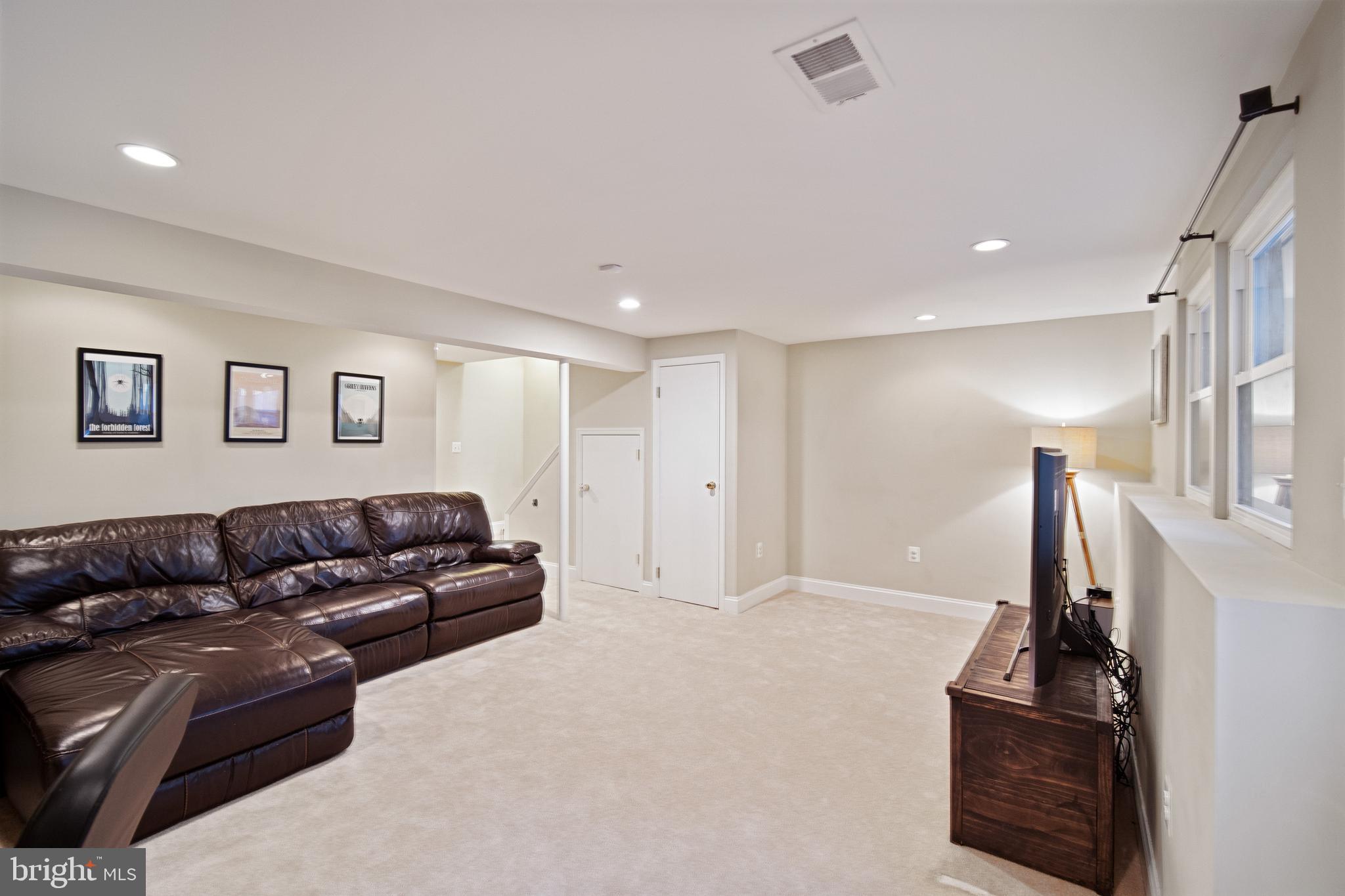 6921 Villa-Del-Rey Court Springfield, VA 22150 - Photo 17 of 28 Great basement for family fun.
