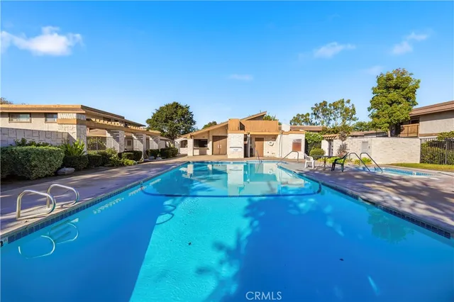 a view of a swimming pool with an ocean view
