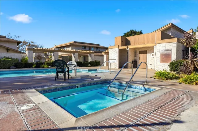 a front view of a house with a swimming pool