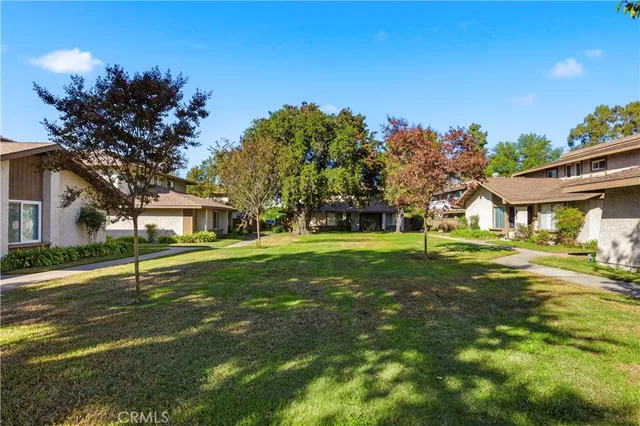 a view of a house with a big yard