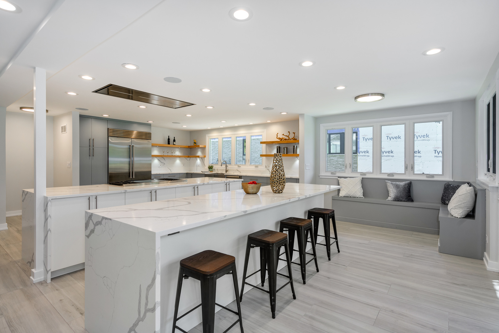 725 Becker Road Glenview, IL 60025 - Photo 10 of 38 a large kitchen with a table and chairs