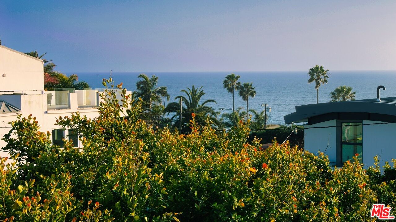7505 Rindge Avenue Playa del Rey, CA 90293 - Photo 2 of 29 view of a house with a yard and garden