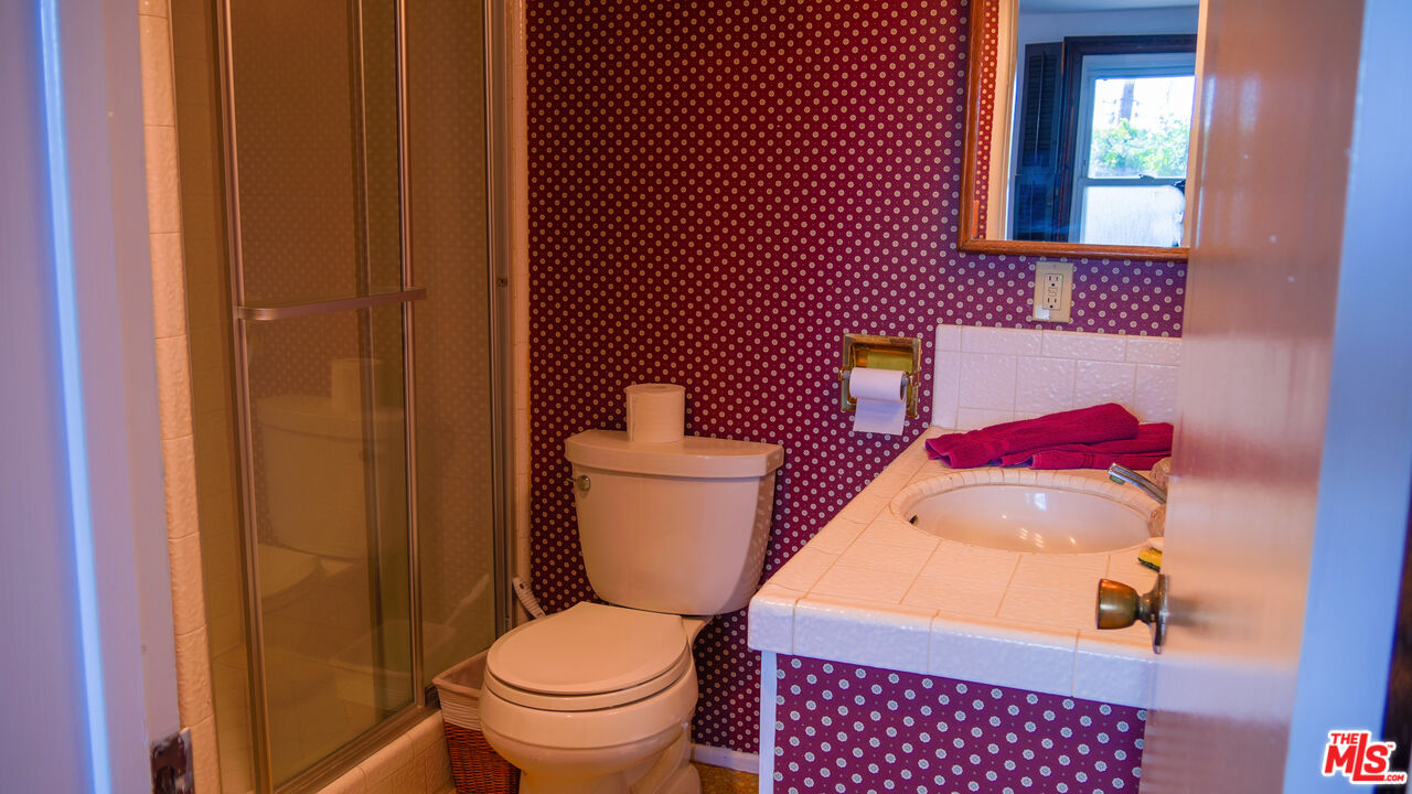 7505 Rindge Avenue Playa del Rey, CA 90293 - Photo 22 of 29 a bathroom with a toilet and a sink