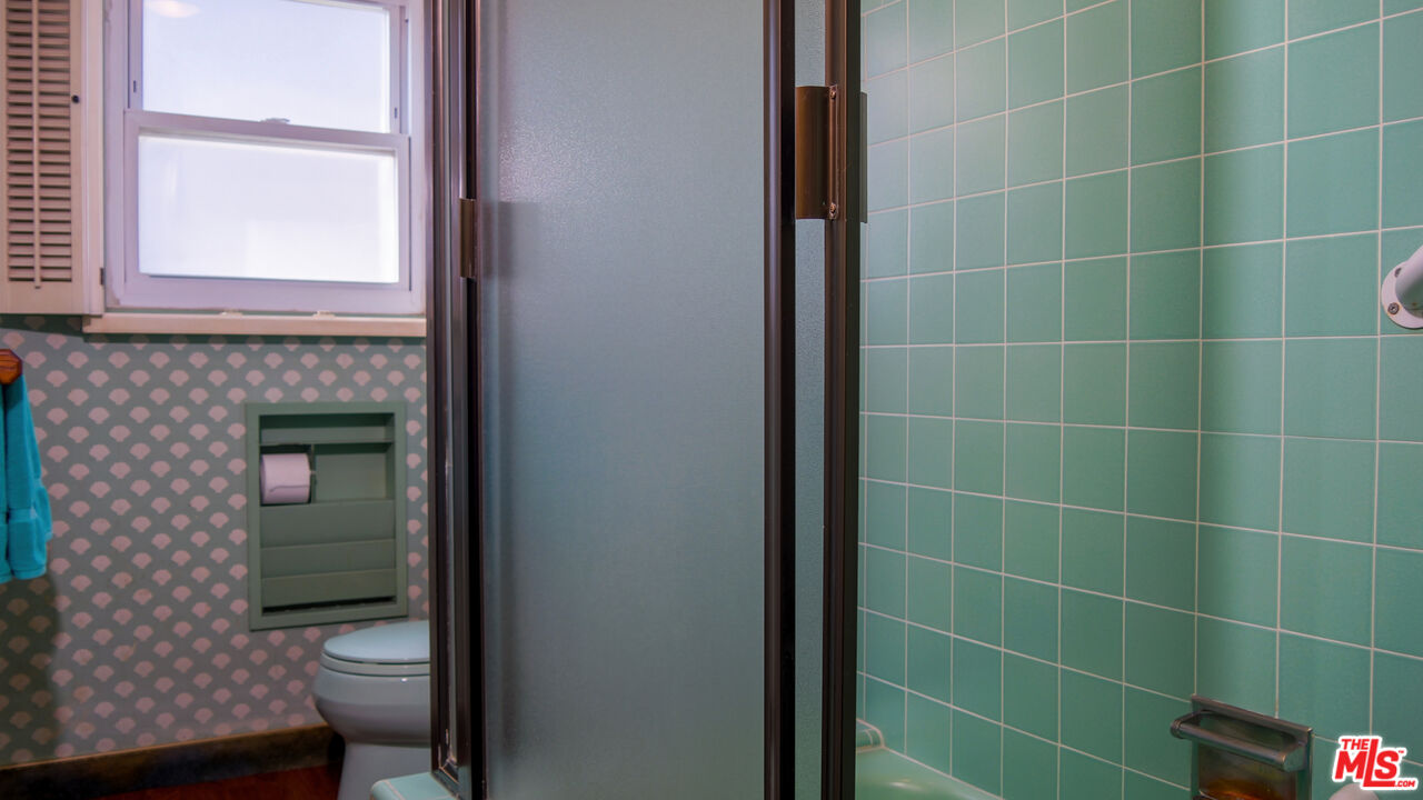 7505 Rindge Avenue Playa del Rey, CA 90293 - Photo 28 of 29 a bathroom with a granite countertop bathtub next to a toilet
