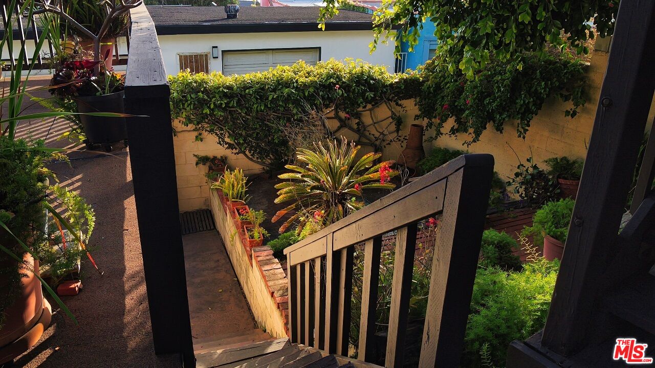 7505 Rindge Avenue Playa del Rey, CA 90293 - Photo 5 of 29 a view of a house with a tree