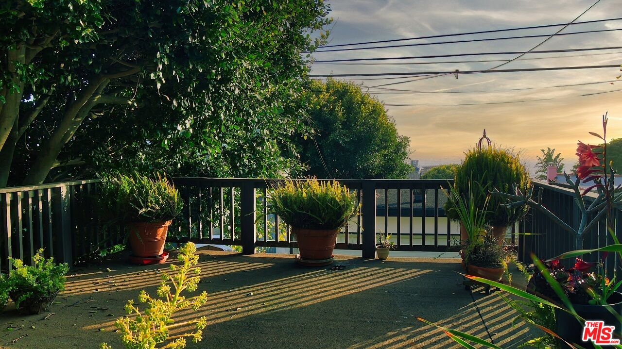 7505 Rindge Avenue Playa del Rey, CA 90293 - Photo 7 of 29 a view of a house with backyard and sitting area