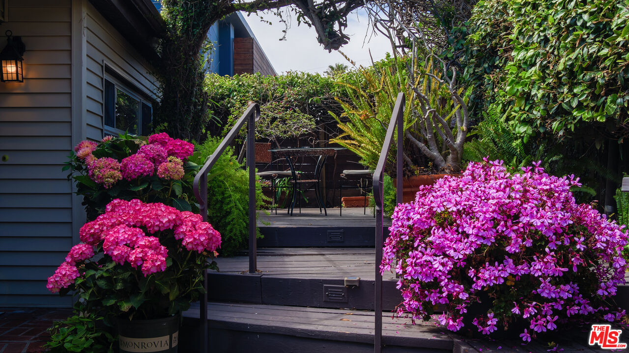 7505 Rindge Avenue Playa del Rey, CA 90293 - Photo 8 of 29 a building view with balcony and garden space