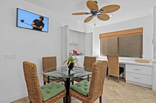 a view of a dining room with furniture