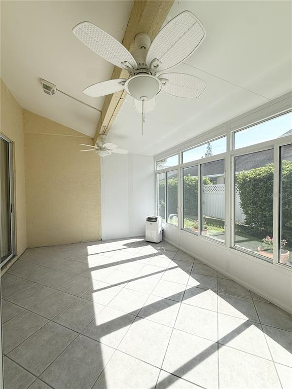 1050 Starkey Road, Unit 704 Largo, FL 33771 - Photo 18 of 27 a room with a bed and large window