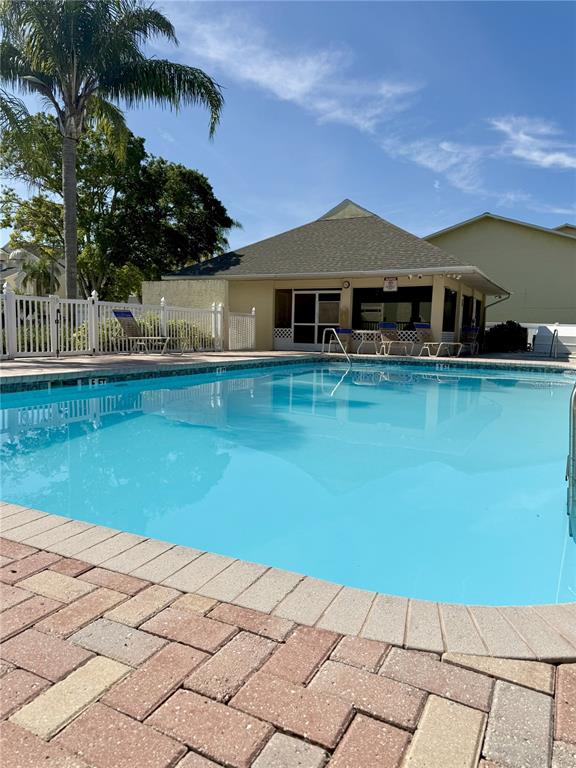 1050 Starkey Road, Unit 704 Largo, FL 33771 - Photo 27 of 27 a front view of a house with a yard