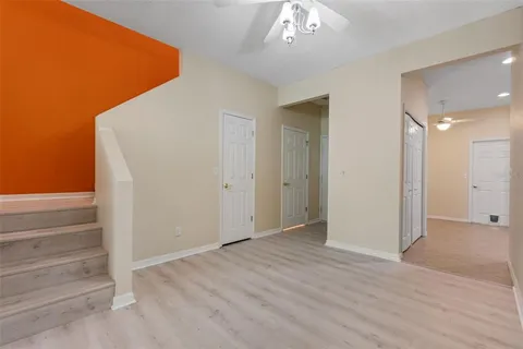 a view of an empty room with a window