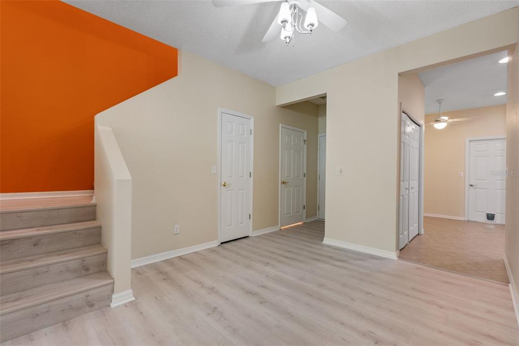1050 Starkey Road, Unit 704 Largo, FL 33771 - Photo 7 of 27 wooden floor in an empty room