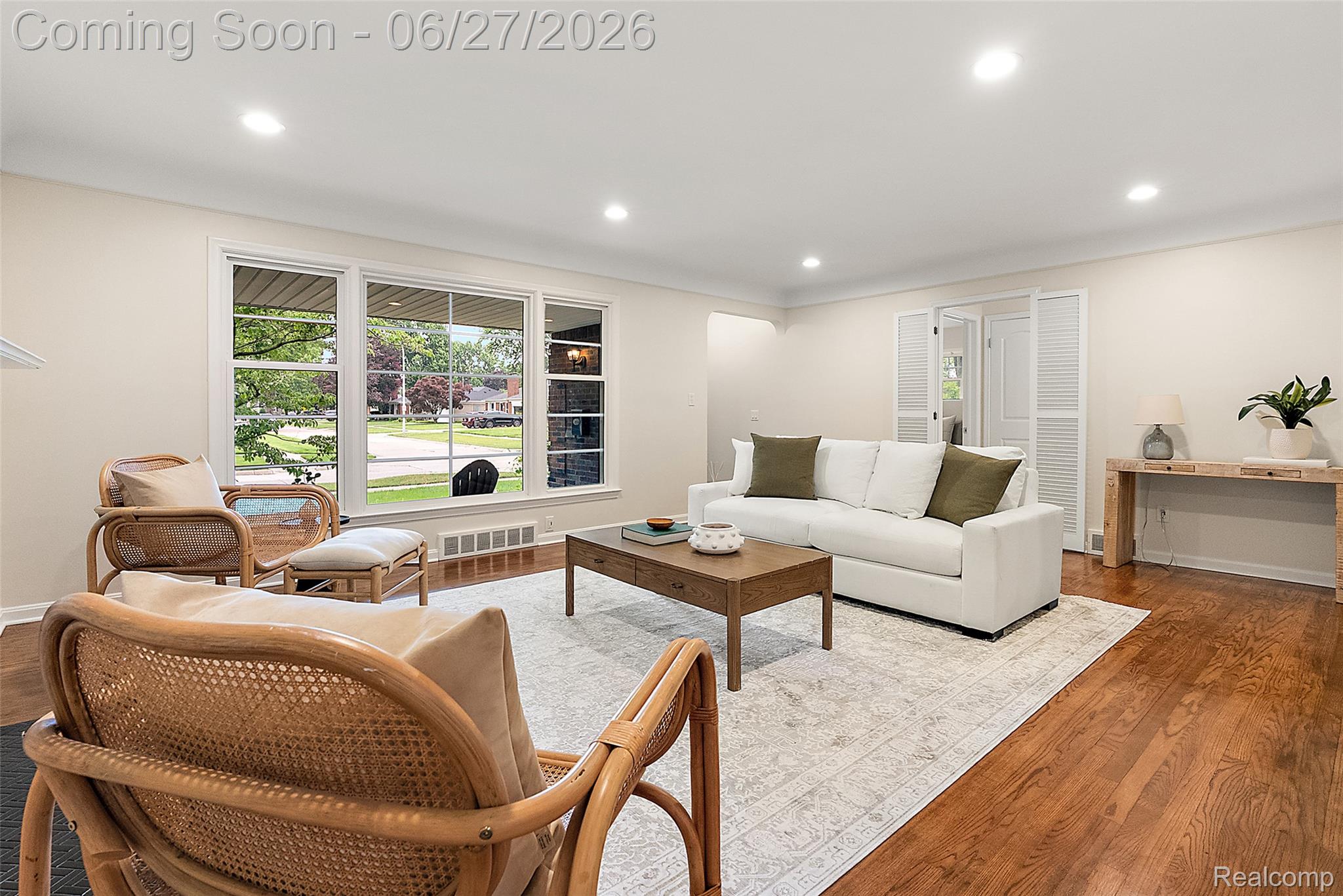 21235 River Road Grosse Pointe, MI 48236 - Photo 5 of 39 Hardwood floors flow throughout much of the home, while recessed lighting brightens the main living areas