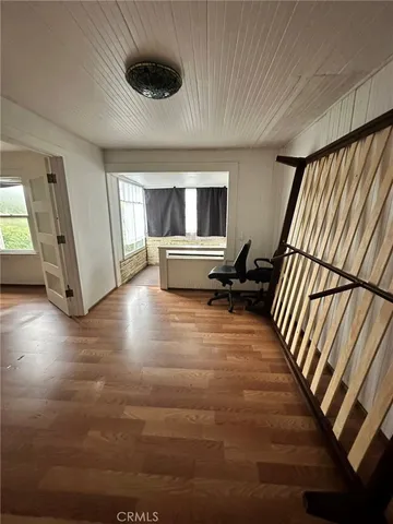 a view of livingroom with furniture and staircase