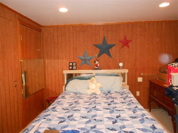 12 Kalmia Road Holbrook, MA 02343 - Photo 17 of 17 a bedroom with a bed and a closet