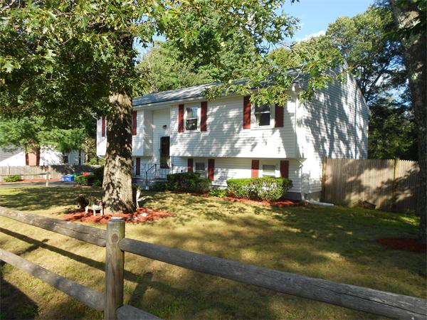 12 Kalmia Road Holbrook, MA 02343 - Photo 3 of 17 a front view of a house with garden