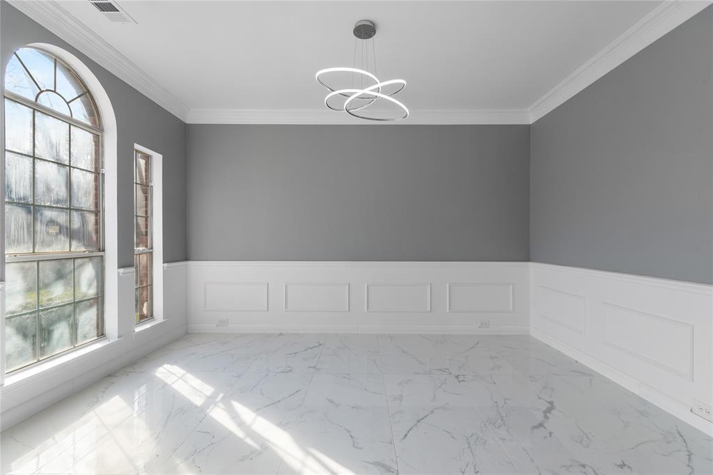 225 Freedom Court Rockwall, TX 75032 - Photo 5 of 28 a view of an empty room with a window
