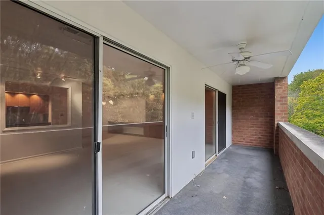 a view of a balcony with an outdoor space