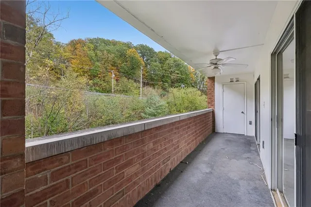 a view of a lake with a building in the background
