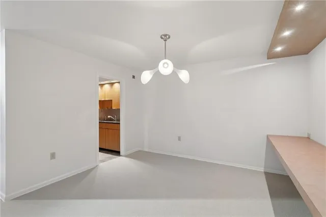 a view of room with a fan