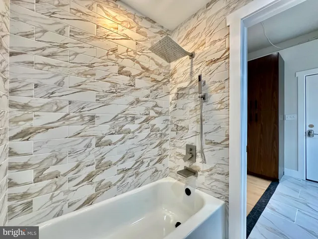a bathroom with a bathtub