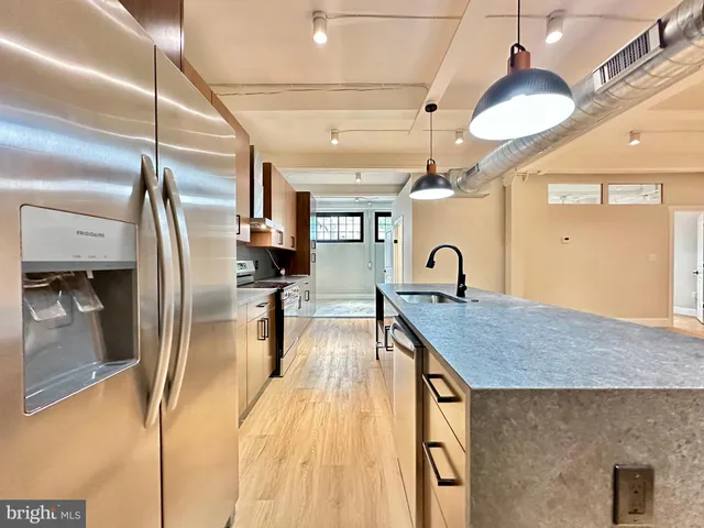 a bathroom with a sink double vanity and a mirror