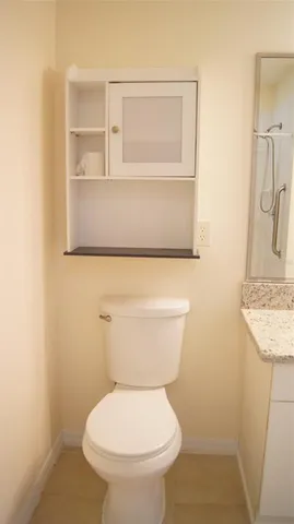 a bathroom with a toilet and a sink