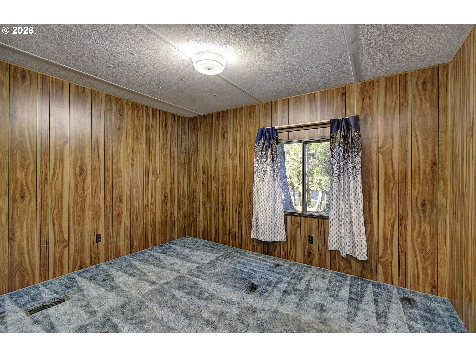 41615 Northeast Cedar Ridge Road Amboy, WA 98601 - Photo 14 of 44 a view of an empty room with a window