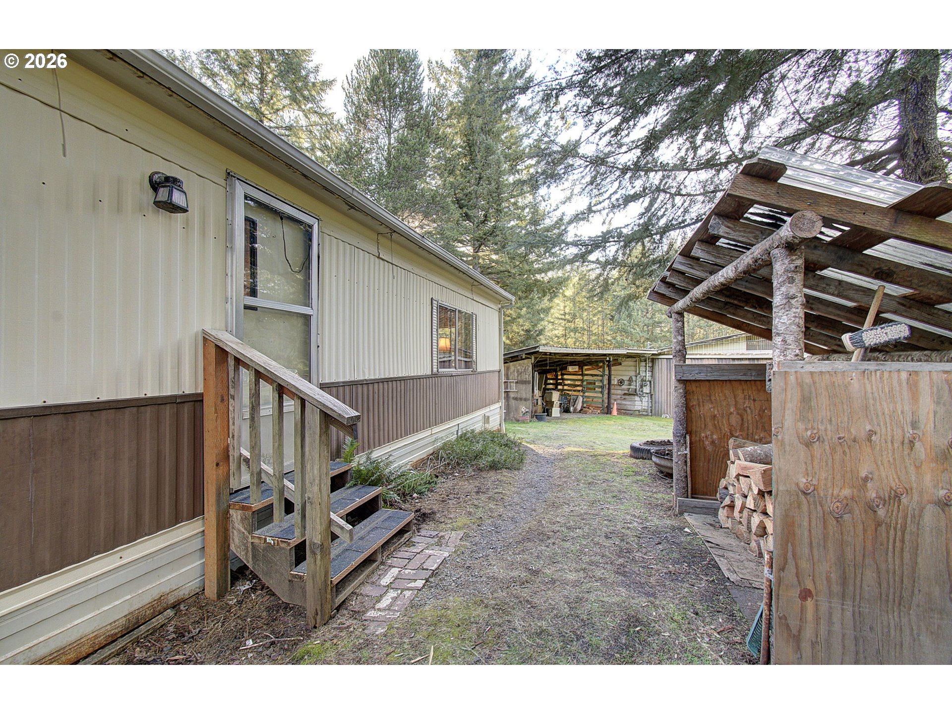 41615 Northeast Cedar Ridge Road Amboy, WA 98601 - Photo 2 of 44 a view of a house with a yard