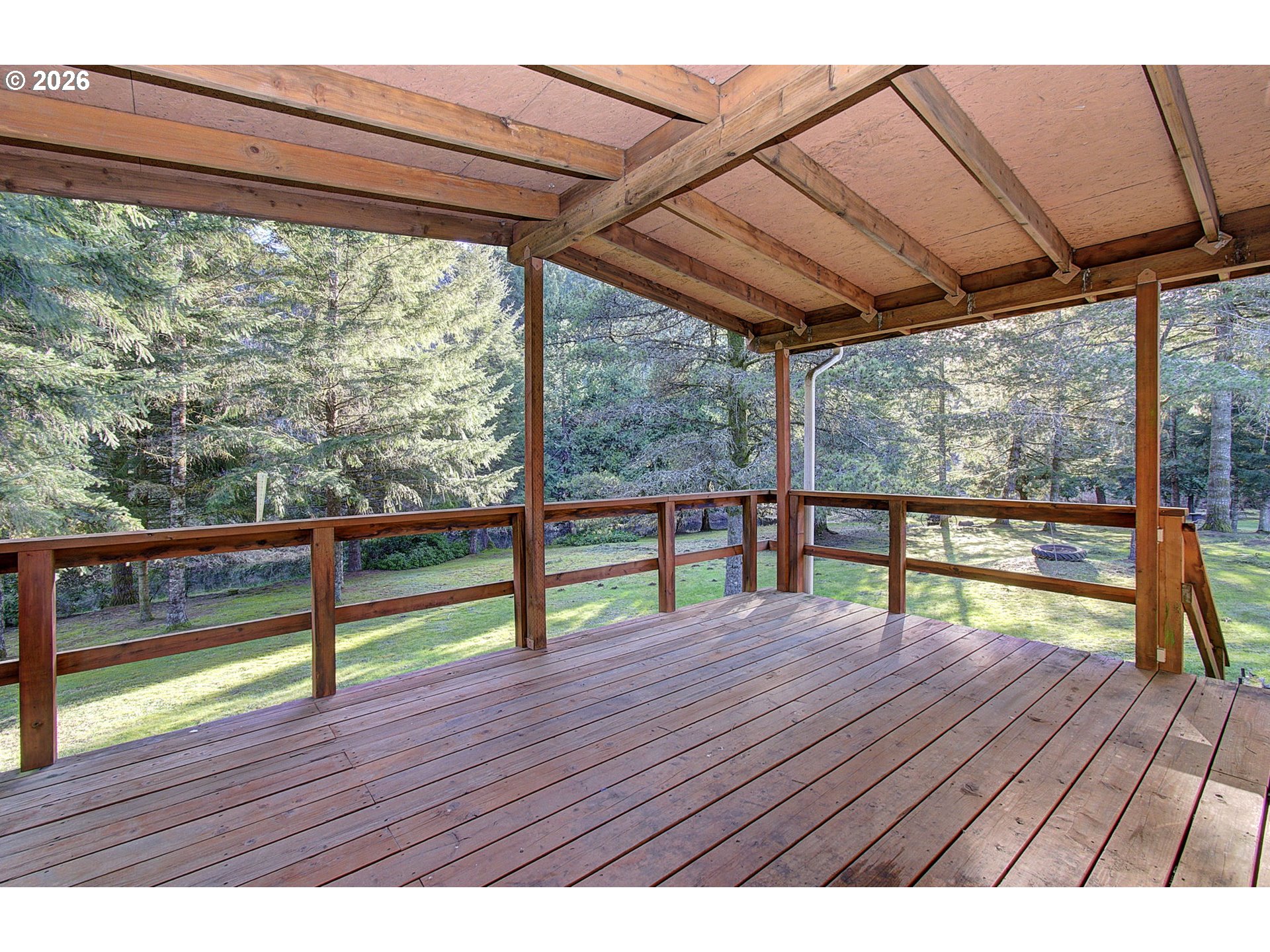 41615 Northeast Cedar Ridge Road Amboy, WA 98601 - Photo 25 of 44 a view of porch with wooden floor and outdoor space