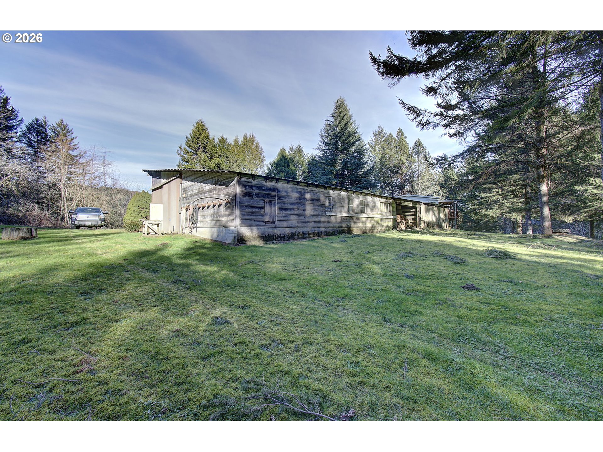 41615 Northeast Cedar Ridge Road Amboy, WA 98601 - Photo 32 of 44 a backyard of a house with lots of green space