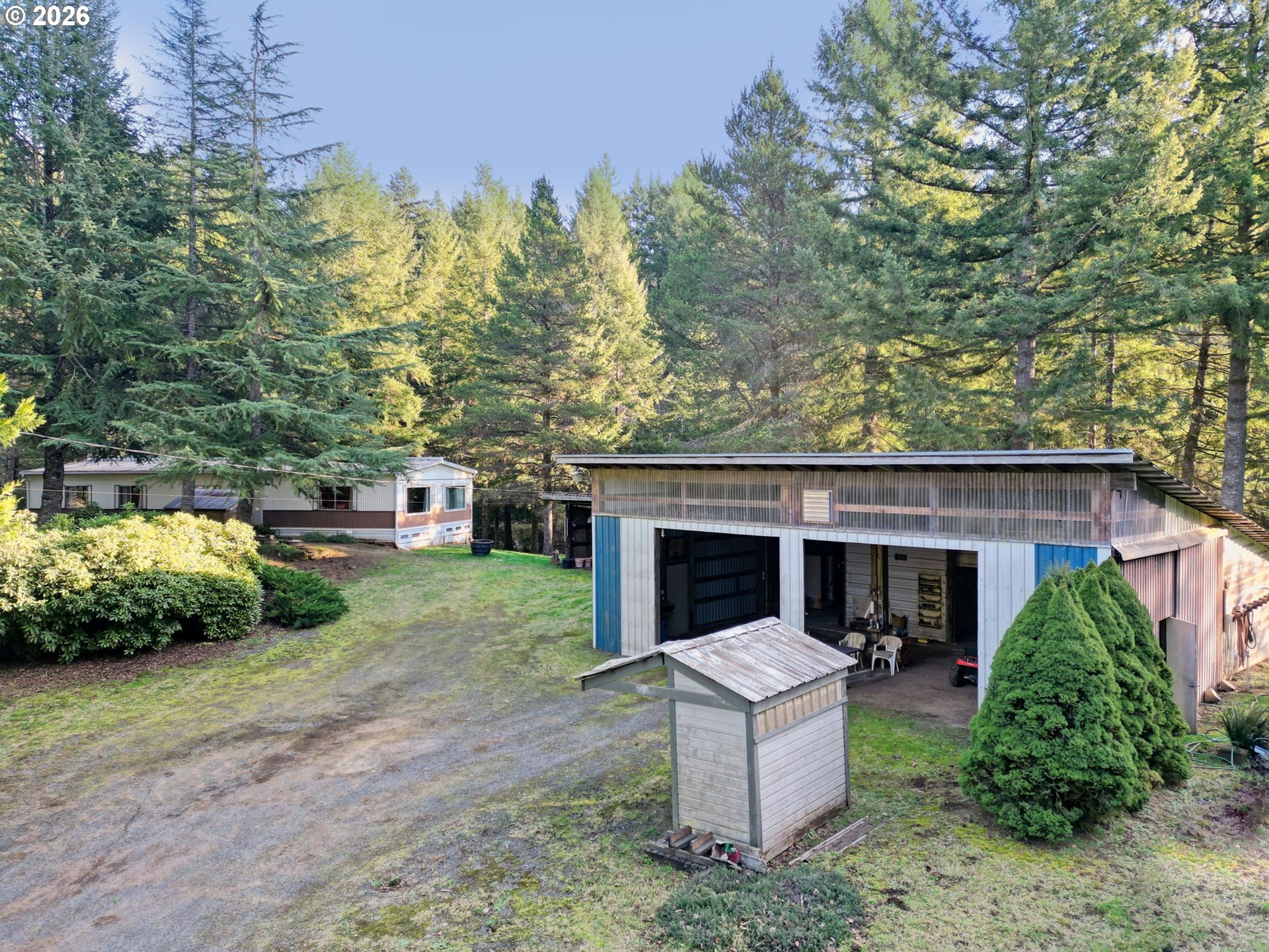 41615 Northeast Cedar Ridge Road Amboy, WA 98601 - Photo 44 of 44 a front view of a house with garden