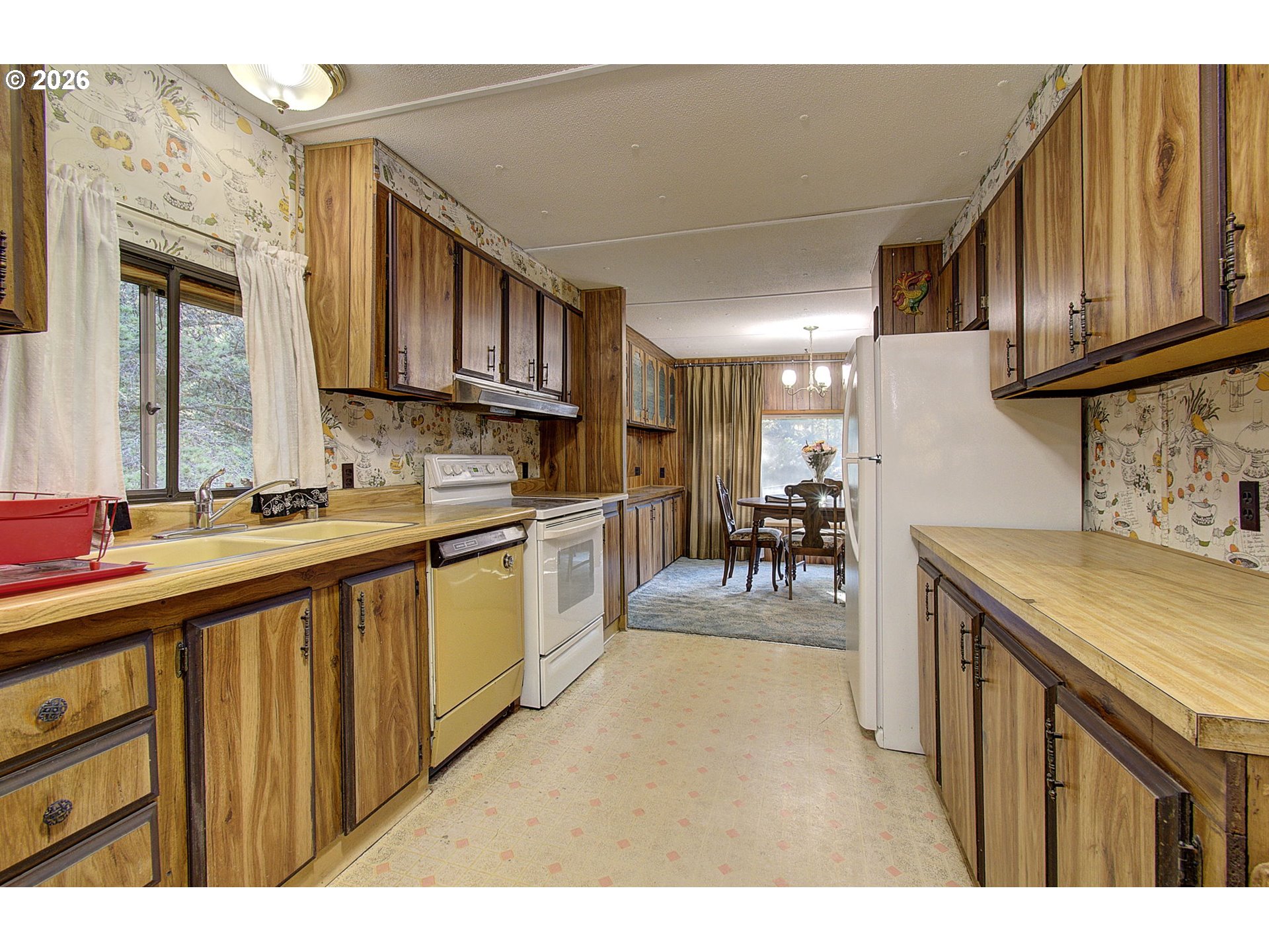 41615 Northeast Cedar Ridge Road Amboy, WA 98601 - Photo 8 of 44 a kitchen with stainless steel appliances granite countertop a sink dishwasher stove and cabinets