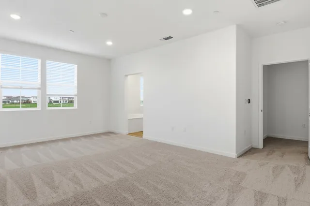 an empty room with windows