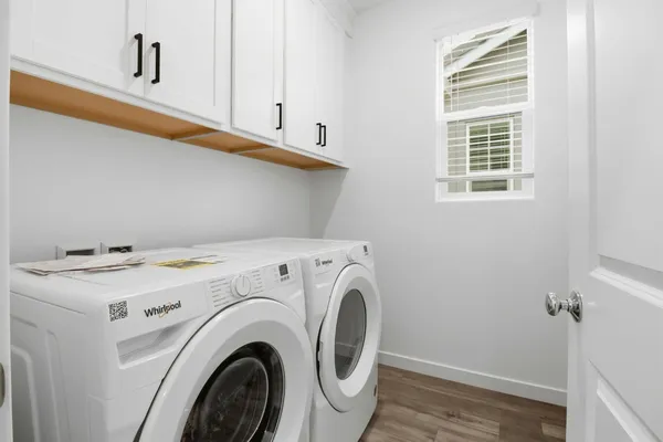 a utility room with dryer and washer